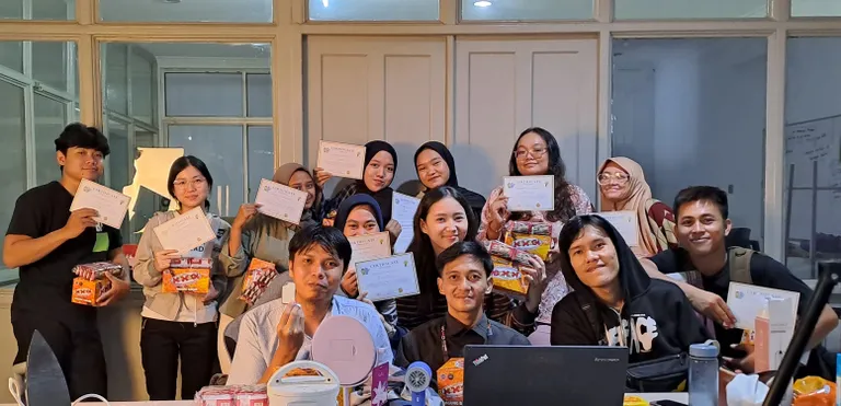 SanasiniAI team with training certificates